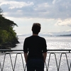 A silhouette of Eoin looking out towards Kenmare Bay
